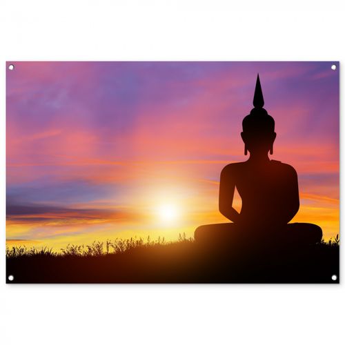 Boeddha silhouet bij zonsopgang