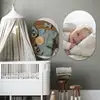 Muurovaal met foto - sfeerbeeld - twee ovalen in een babykamer