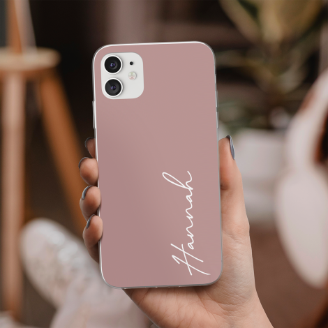 Roze telefoonhoesje met naam in witte kleur