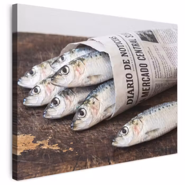 Canvas schilderij - Sardientje - krant - snijplank